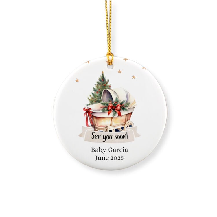 Personalized Pregnancy announcement round ornament picturing a baby crib in front of a Christmas tree in wartercolor