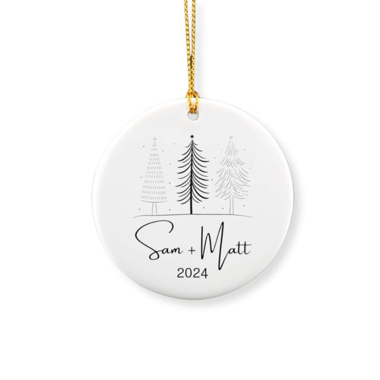 Personalized couple round ornament featuring a minimalist Christmas tree sketch with a couple first names and year.