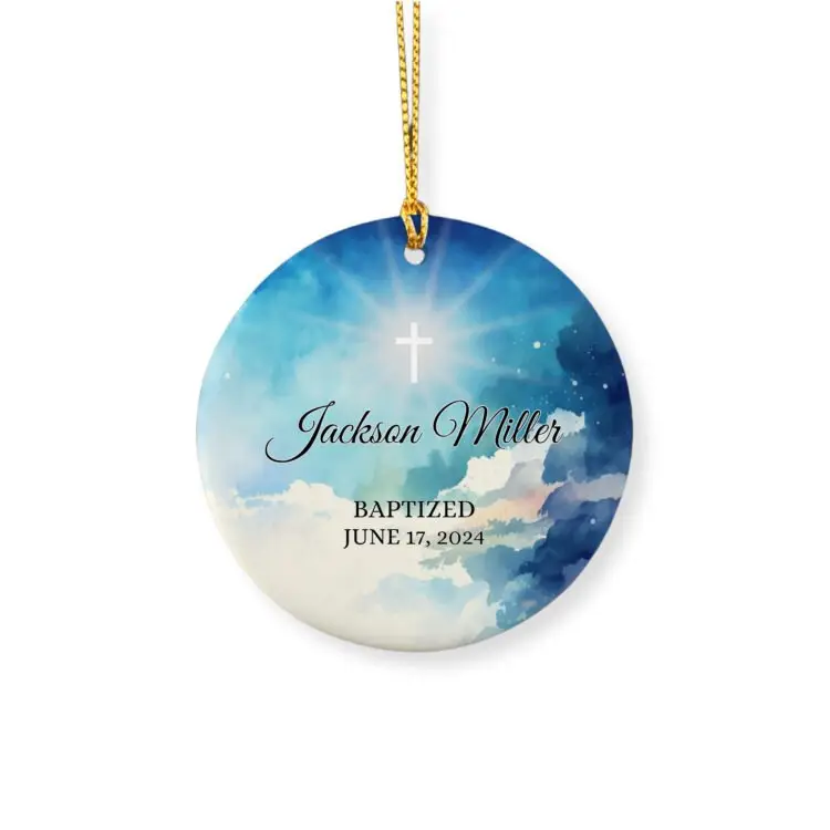 Personalized baptism ornament featuring a dark sky perced by the light coming of a cross, a name and the baptism date