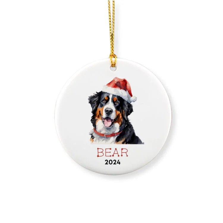 Personalized ornament showcasing a Bernese Mountain dog with a red hat and a name