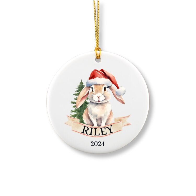 Personalized Bunny ornament with name in front of a Christmas tree