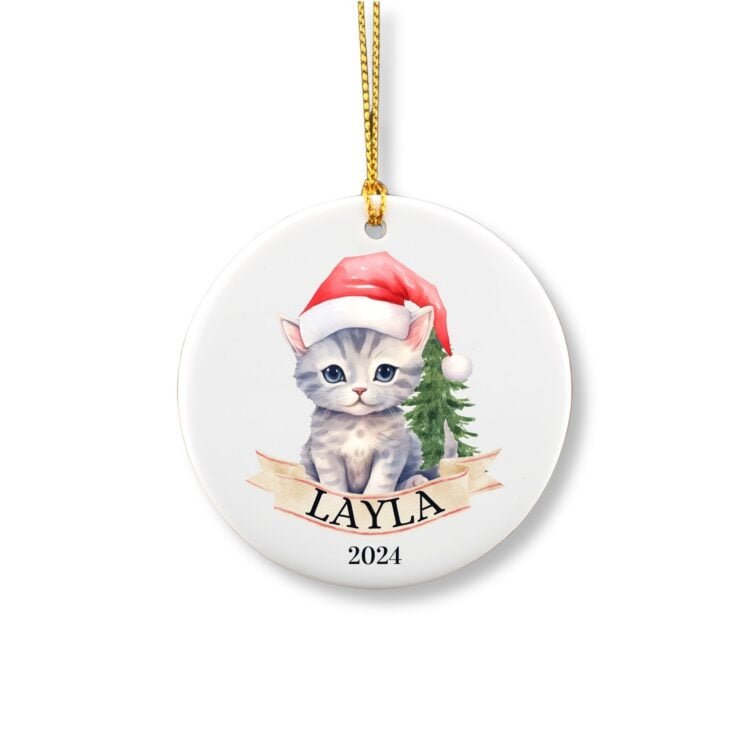 Personalized Grey Cat ornament with name in front of a Christmas tree