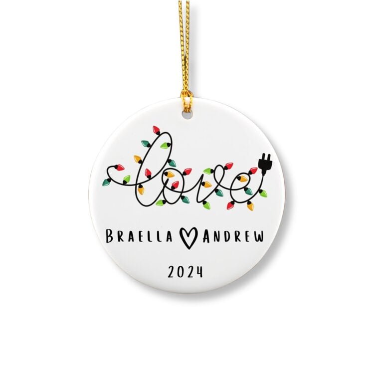 Personalized-round-ornament-for-couple-featuring-Christmas-light-in-the-shape-of-the-word-LOVE-and-with-a-couple-names-and-date