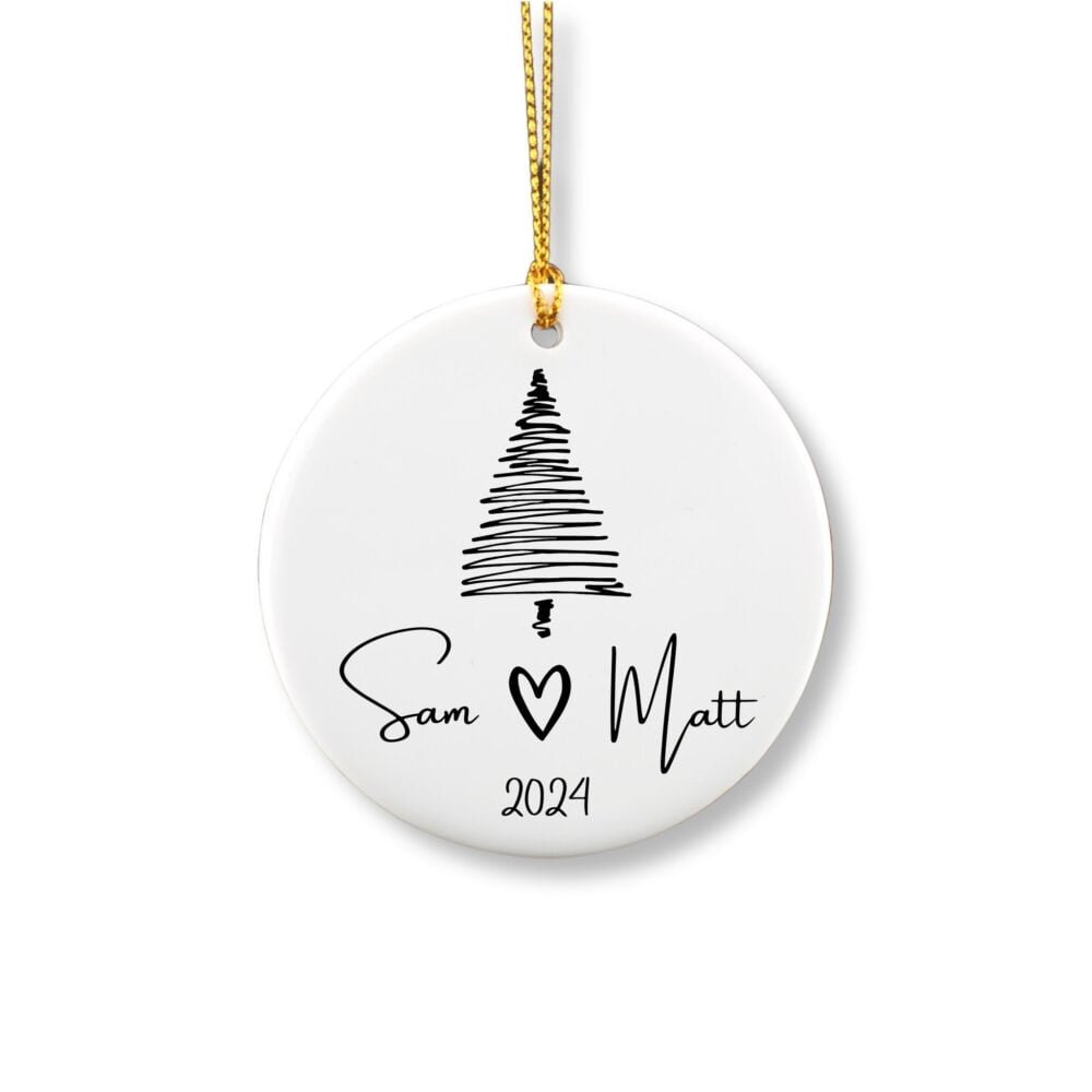 Personalized round ornament for couple featuring a Christmas tree draw with a marker pen and with a couple names and date