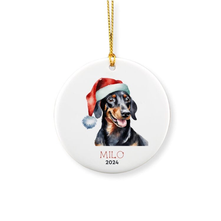 Personalized ornament showcasing a black Dachshund with a red hat